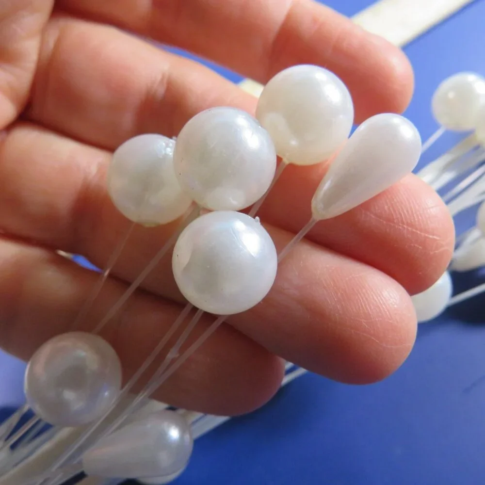 Pearl Cascading Floral Pick (has some wire but mostly clear filament) vintage
